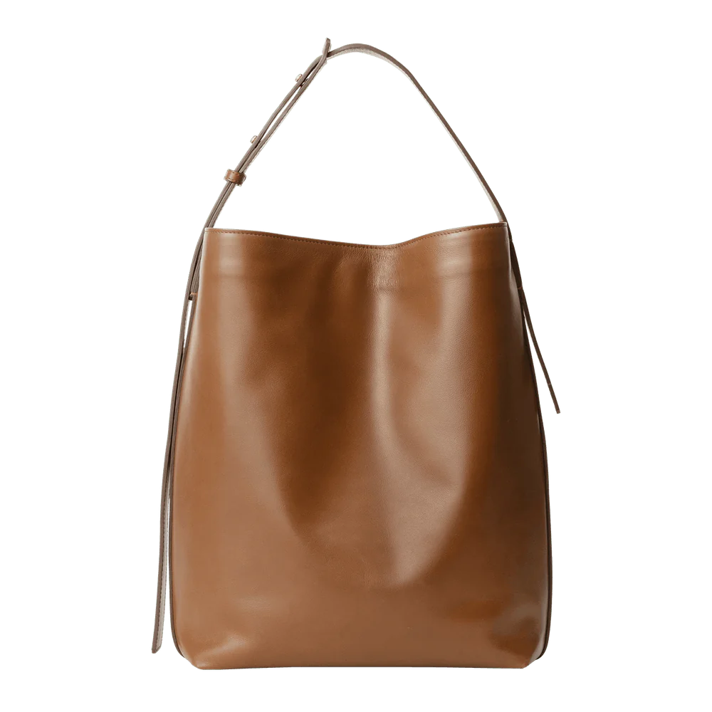 Levant Leather Medium brown designer leather bucket tote bag with structured silhouette and adjustable strap